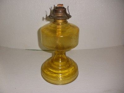 UP FOR SALE IS THIS EAGLE OIL BURNER AND GOLD GLASS LAMP W/STIPPLED 