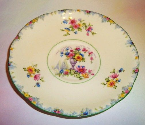 Floral in Vase Royal Paragon Haddon Hall Tea Cup and Saucer Set  